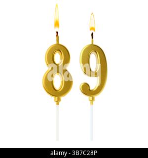 Burning golden cake candles composing number 89 on white background. Festive decoration for birthday or other special date Stock Photo