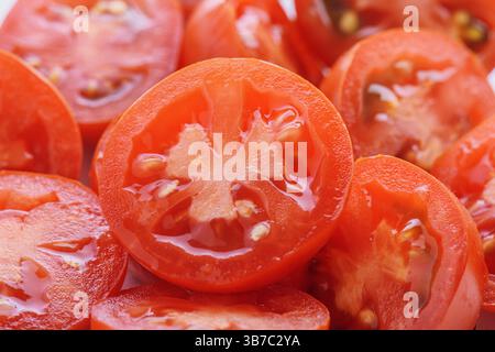 Closeup view of sliced fresh juicy tomatoes Stock Photo