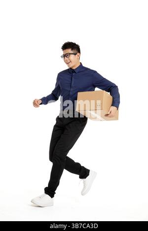 A tech-savvy young professional using AR glasses for efficient package delivery. Stock Photo