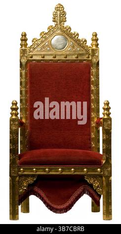 A medieval gold reproduction throne on a cutout background. Stock Photo