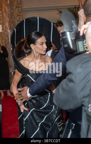 Demi Moore wearing Thom Browne departs the Pierre Hotel for 2025 Met ...