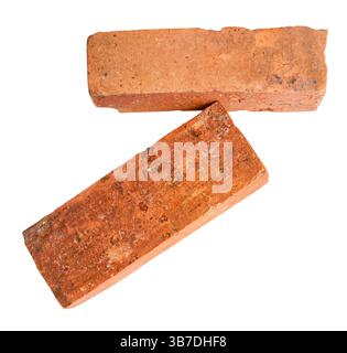 Side view of two old red or orange bricks is isolated on white background with clipping path. Stock Photo