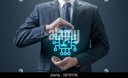 Businessman is showing an icon representing technical support in his hand. Technology innovation on a virtual screen. Concept of technical support or Stock Photo