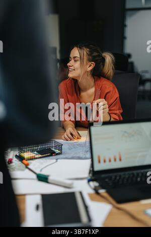 A group of multiracial business people brainstorm ideas and solutions in a modern office. Stock Photo