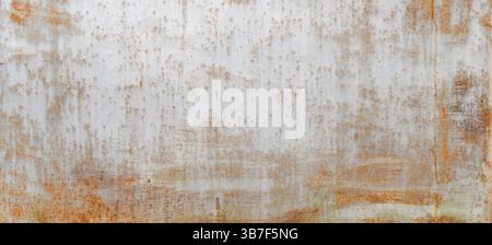 Rust dirty metal wall is used as old metal background texture. Stock Photo