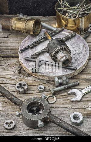 Set of old tools of the keys, screws and drills Stock Photo