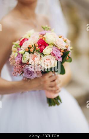 Wedding bouquet in hands of the bride. Wedding in Montenegro Stock Photo