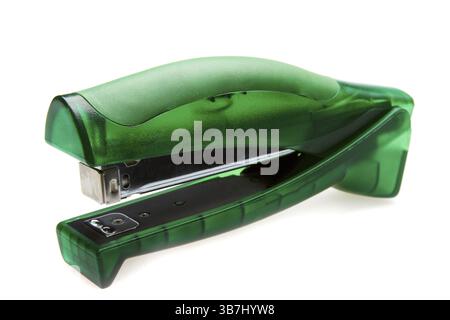 Green stapler on white background Stock Photo