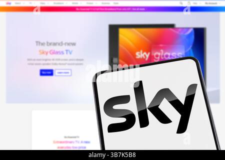 Stuttgart, Germany - February 8, 2025: SKY Pay TV logo tv station streaming website on a mobile phone and computer screen in Stuttgart, Germany. Stock Photo
