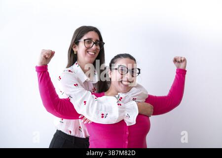 Empowered Women Supporting Each Other: A Celebration of Strength and Friendship in a Positive Image Stock Photo