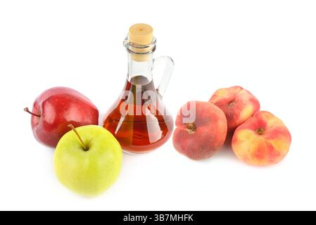 Apples, peaches and fruit juice in a jug isolated on white background. Collage. Stock Photo