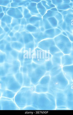 Blue water in the pool under the sun. Close-up. Stock Photo