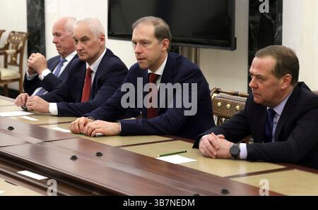 May 15, 2024, Moscow, Moscow Oblast, Russia: Sitting from left: Rostec State Corporation CEO Sergei Chemezov, Russian Defence Minister Andrei Belousov, First Deputy Prime Minister Denis Manturov and Security Council Deputy Chairman Dmitry Medvedev wait for the arrival of Russian President Vladimir Putin for a meeting on the progress of the military industrial complex at the Kremlin, May 15, 2024, in Moscow, Russia. (Credit Image: © Vyacheslav Prokofyev/Kremlin Poo/Planet Pix via ZUMA Press Wire) Stock Photo