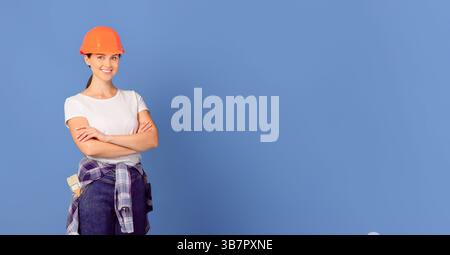 Repairment Budget Planning. Portrait Of Man And Woman Repair Masters In Helmets Stock Photo