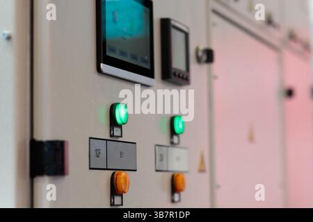 Control panel of modern electric power distribution equipment. Electrical distribution cabinets. Selective focus. Stock Photo