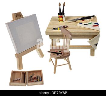 Paint brushes and an assortment of Paint for painting on an easel Stock Photo