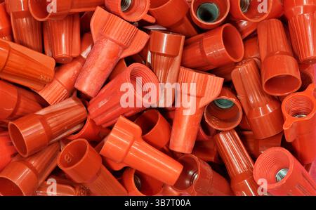 Electrical yellow wire connectors wing nuts plastic computer components. Stock Photo