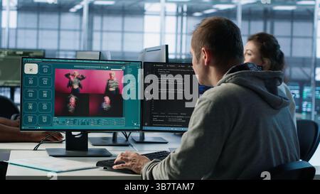 Engineer in server hub making AI software turning text prompt into photos. Technician in data center building text to image artificial intelligence generator transforming words into pictures, camera A Stock Photo