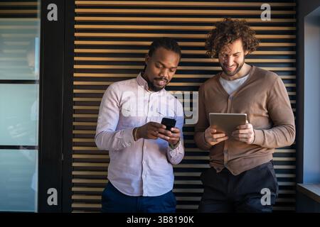 Happy software developers working on meeting, Programming advanced code artificial intelligence. Stock Photo