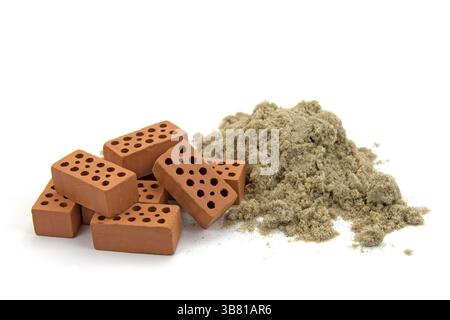 A pile of bricks against a white background Stock Photo