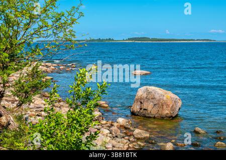 Rocky shoreline of Baltic Sea near Kaberneeme in sunny day. Estonia Stock Photo