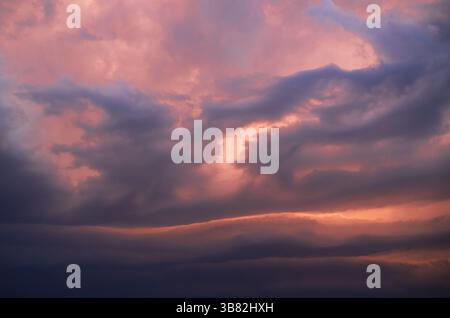 Beautiful stormy sky at sunset Stock Photo