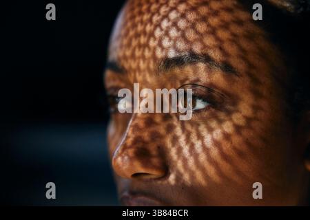 Close-up of sunlight shining on woman's face Stock Photo