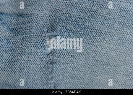 Light Denim Texture Jeans With Torn Stock Photo