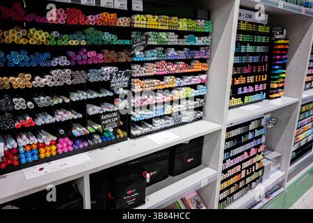 Ivano-Frankivsk, Ukraine - April 29, 2025: Wide assortment of colorful markers arranged neatly on shelves in a store Stock Photo