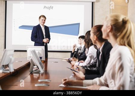 Image of businesswomen interacting at meeting Stock Photo