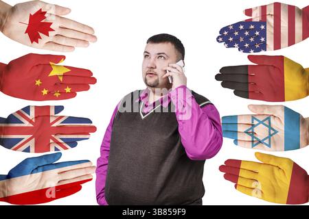 Businessman and many hands with different country flags painted on them isolated on white Stock Photo