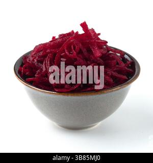 Grated beetroot in ceramic bowl. Shredded beet root salad isolated on white Stock Photo