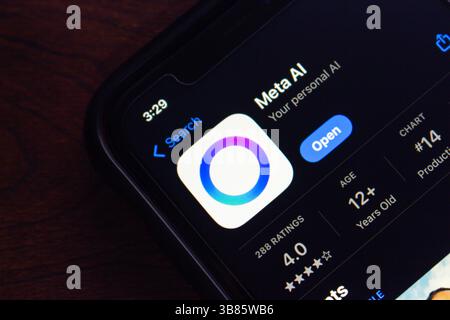 The Meta AI app page in the App Store on a smartphone screen. Meta AI is Meta’s advanced conversational assistant, integrated into its own platforms. Stock Photo