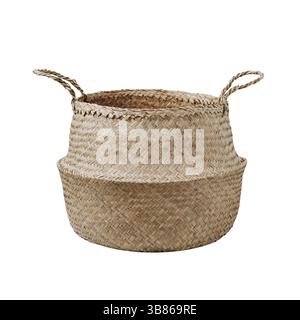 Empty trendy design handwoven seagrass belly basket with handles for storage laundry and toys or can use as cachepot. Round storage basket in braided Stock Photo
