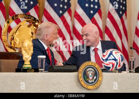 Washington, United States. 06th May, 2025. U.S President Donald Trump, left, chats with FIFA President Gianni Infantino, right, during a meeting of the FIFA World Cup Task Force meeting, at the East Room of the White House, May 6, 2025 in Washington, DC The task force will oversee preparations for the FIFA World Cup to be held in the U.S, Mexico and Canada. Credit: Emily Higgins/White House Photo/Alamy Live News Stock Photo