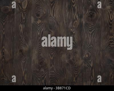 Wood background. Dark wooden texture empty surface. Copy space for text and design. Dark brown larch rustic wooden table top. vertical stripes of boar Stock Photo