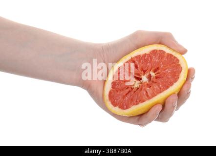 Woman squeezing grapefruit on white background, closeup Stock Photo