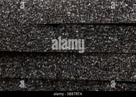 black sponge for giving elasticity to objects or sound insulation or as a packaging material Stock Photo