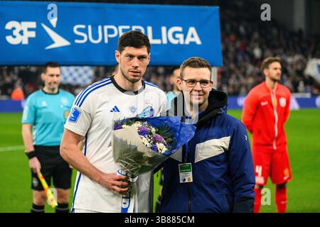 February 26, 2024, Copenhagen, null, Denmark: Copenhagen, Denmark. 26th, February 2024. Scott McKenna of FC Copenhagen receives flowers as a new Copenhagen-player before the 3F Superliga match between FC Copenhagen and FC Nordsjaelland at Parken in Copenhagen. (Credit Image: © Gonzales Photo/Gonzales Photo via ZUMA Press) Stock Photo