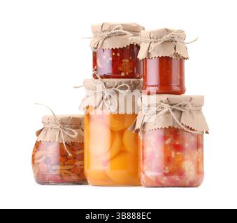 Many jars with different pickled products isolated on white Stock Photo