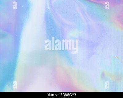 Beautiful holographic rainbow abstract background in pastel and neon color design. Real photography shot of holographic foil for creative project - de Stock Photo
