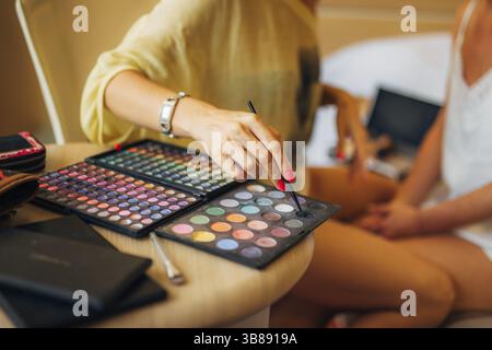 Case makeup artist. A set of brushes, powder, foundation. Tools make-up artist in a box Stock Photo