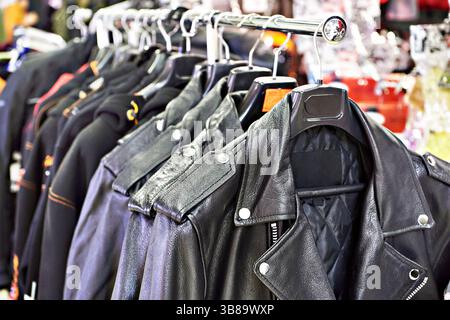 Motorcycle leather jackets in store Stock Photo