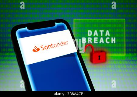 May 31, 2024, Asuncion, Paraguay: Santander logo is displayed on a smartphone in front of the words ''data breach'', visual representation of open padlock and binary code digits. (Credit Image: © Andre M. Chang/ZUMA Press Wire) Stock Photo