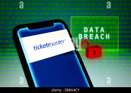 May 31, 2024, Asuncion, Paraguay: Ticketmaster logo is displayed on a smartphone in front of the words ''data breach'', visual representation of open padlock and binary code digits. (Credit Image: © Andre M. Chang/ZUMA Press Wire) Stock Photo