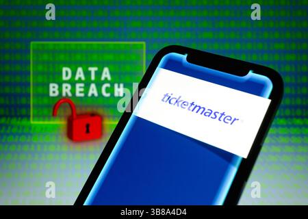 May 31, 2024, Asuncion, Paraguay: Ticketmaster logo is displayed on a smartphone in front of the words ''data breach'', visual representation of open padlock and binary code digits. (Credit Image: © Andre M. Chang/ZUMA Press Wire) Stock Photo