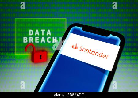 May 31, 2024, Asuncion, Paraguay: Santander logo is displayed on a smartphone in front of the words ''data breach'', visual representation of open padlock and binary code digits. (Credit Image: © Andre M. Chang/ZUMA Press Wire) Stock Photo