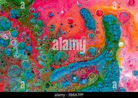 Multicolored texture made with paint, drops and bubbles, perfect for backgrounds and graphic resources. Stock Photo
