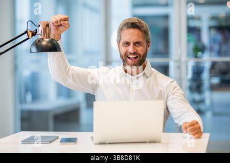 Freelance working online. Man using laptop in office. Business freelancing. Man office manager. Businessman has online business. Businessman success Stock Photo