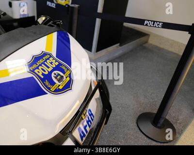 Close-up of Philadelphia Police badge and motto on electric cart at the Philadelphia International Airport in Pennsylvania; honor service, integrity. Stock Photo